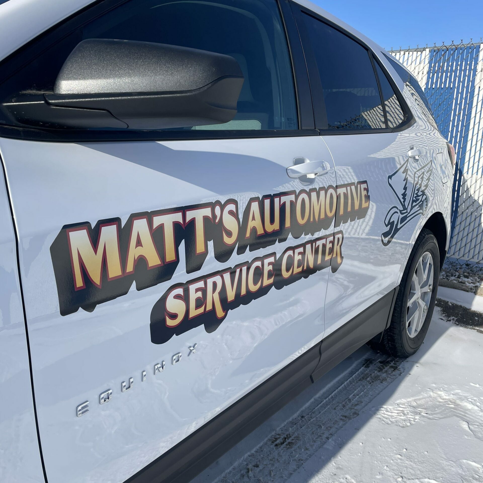 Side view of Matt's Automotive fleet graphics